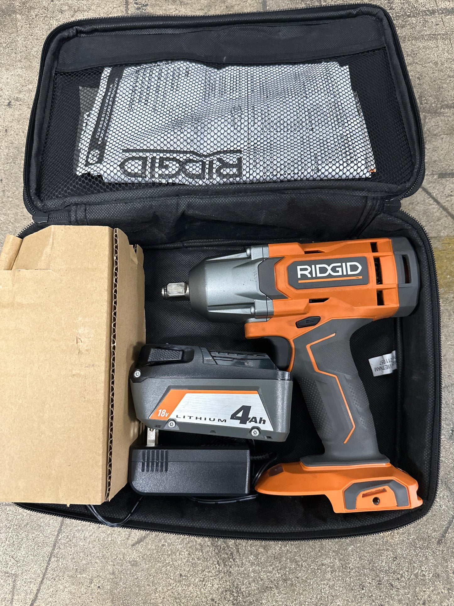 RIDGID 18V Brushless Cordless 4-Mode 1/2 in. High-Torque Impact Wrench Kit with 4.0 Ah Battery and Charger